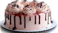 Pink frosted layer cake with chocolate drip glaze and swirled cream rosettes topped with chocolate sprinkles on white cake stand for bakery dessert menu.
