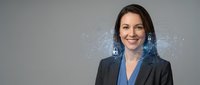 Professional businesswoman with digital security network overlay representing cybersecurity technology and data protection in corporate environment.