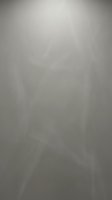 Abstract gray gradient background with soft light rays and subtle texture for modern design projects and presentations.