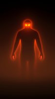 Mysterious glowing red silhouette of humanoid figure with bright eyes emerging from darkness, creating eerie supernatural atmosphere for horror and fantasy designs.