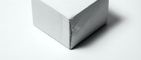 White cardboard box corner detail on clean background for packaging design and product presentation mockups.