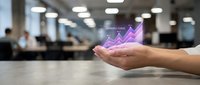 Businessman hand holding holographic growth chart with upward arrow in modern office environment showing business success and financial progress analytics.
