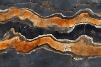 Natural stone texture with flowing orange and black mineral veins creating abstract geological patterns for luxury interior design and architectural projects.