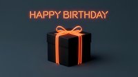 Glowing neon orange happy birthday text above a dark gift box with luminous ribbon on dark background, modern celebration concept.
