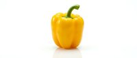 Fresh yellow bell pepper isolated on white background, ready for culinary, food photography, recipe, and design projects.