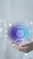 Futuristic holographic spiral energy orb floating above open palm with purple and cyan gradient colors against blurred background for technology concepts.