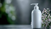 White cosmetic pump bottle with natural purple flowers on soft blurred background for skincare and beauty product mockup presentations.