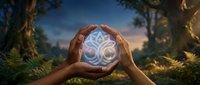 Hands cupping glowing mystical orb with sacred geometry patterns in enchanted forest at twilight for spiritual wellness meditation concepts.