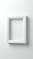 White empty picture frame hanging on a light wall with soft shadow, mockup for artwork, photo, or poster display presentation.