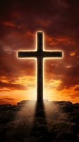 Wooden cross silhouetted against dramatic sunset sky with glowing light rays for Easter and Christian faith concepts.