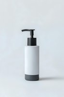 Minimalist white and gray soap dispenser with black pump on light background, modern bathroom accessory for cosmetic product mockup presentation.