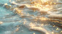 Sparkling water surface with golden sunlight reflections creating magical bokeh effect and gentle ripples in turquoise ocean waves during sunset.