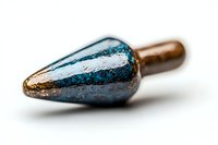Vintage metal pen nib with blue ink residue and rust texture on white background, macro photography showing detailed wear patterns and artistic patina.