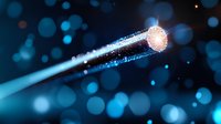 Glowing optical fiber transmitting digital data signals with light effects and bokeh on dark blue background, modern telecommunications concept.