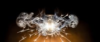 Bright electric sparks and smoke effects on dark background creating dramatic lighting display for creative projects and digital art compositions.