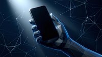Futuristic robotic hand holding smartphone with digital network connections and glowing light effects on dark blue technology background.
