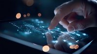 Fingers touching digital tablet screen with glowing network connections and data visualization elements against dark background with bokeh light effects.