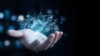 Digital transformation concept with glowing business icons floating above open palm against dark background for technology presentations.