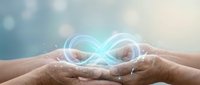 Two hands holding a glowing infinity symbol representing endless possibilities, sustainability, and continuous growth for business, technology, and innovation concepts.