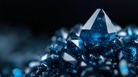Macro shot of deep blue crystal formation with sharp geometric edges against dark background, showcasing natural mineral structure and light reflection.