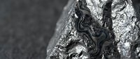 Raw silver ore mineral specimen with metallic luster and natural crystalline formations for geology education and mining industry applications.