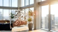 Business hand holding glowing network sphere in modern office with city view representing digital connectivity and global communication technology.