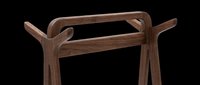 Wooden coat rack with curved handles isolated on transparent background, ready for interior design, furniture mockups, e-commerce, and digital home decor projects.
