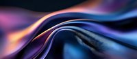 Abstract flowing curves in vibrant purple, orange and blue colors create dynamic motion effect against dark background, suitable for modern design projects and presentations.