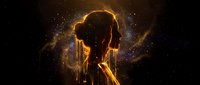 Young woman silhouette with glowing golden light effects and particles creating magical atmosphere against dark starry background for creative projects.