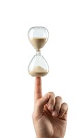 Isolated hourglass with golden sand held by human hand on white background, symbolizing time management, deadline, urgency and business concept for design use.