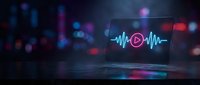 Young male podcaster or audio engineer with headphones, working in modern studio setup with neon sound wave visualization on screen for music production, streaming, or podcast recording.