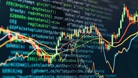 Financial trading charts with programming code overlay showing market analysis and algorithmic trading development for investment strategies.
