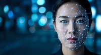 Young Asian businesswoman with facial recognition technology overlay against blue bokeh lights background for AI and biometric security concepts.