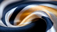 Abstract flowing fabric waves in navy blue and golden yellow colors creating elegant curved patterns with soft lighting and smooth textile texture.