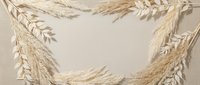 Elegant wheat ears and pampas grass frame on neutral beige background. Natural botanical border for organic food packaging, harvest festival designs.