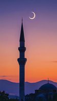 Crescent moon over mosque minaret silhouette against vibrant purple and orange sunset sky, with mountain range in background creating peaceful spiritual scene.