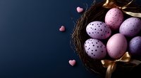 Decorated Easter eggs in pink and purple shades with polka dot pattern nestled in dark nest with gold ribbon and scattered heart decorations on navy background.