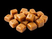 Soft caramel candy cubes pile isolated on transparent background, ready for sticker, t-shirt design, print on demand, sublimation, and clipart use.