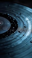 Macro shot of vinyl record with water droplets in blue tones, showcasing grooves and texture for music and audio concepts.