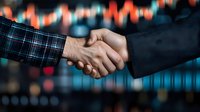 Business handshake agreement with financial trading charts and market data analytics background for corporate partnership deals.