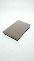 Closed hardcover book with gray linen fabric cover and dark spine on white background. Suitable for publishing, education, and literature concepts.