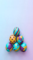 Colorful Easter eggs with geometric patterns and polka dots arranged on pastel gradient background for spring holiday celebrations and decorations.