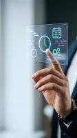 Businessman hand touching holographic interface displaying clock, calendar, and gears icons for time management and productivity planning in modern business workflow.