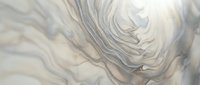 Abstract marble texture with flowing beige and gray veins creating elegant swirled patterns for luxury interior design and sophisticated backgrounds.
