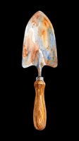 Vintage garden trowel with wooden handle isolated on transparent background. Ready for clipart, t-shirt design, stickers, print-on-demand products and sublimation projects.