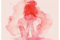 Emotional watercolor artwork in pink and red tones showing young woman with messy bun hairstyle resting head in hands, expressing feelings of sadness and vulnerability.