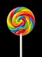 Colorful spiral lollipop with red, blue, yellow, green and orange swirls on white stick, isolated on transparent background, ready for clipart, t-shirt design and print-on-demand use.