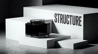 Minimalist monochrome display featuring geometric white and black platforms with ink bottle, emphasizing structure and design for branding, packaging, and editorial layouts.