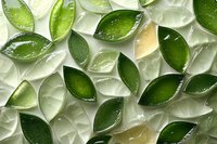 Fresh lime wedges and ice cubes arranged in pattern on white background, top view. Refreshing summer drink concept for cocktail and beverage design.