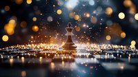 Chess king piece on reflective surface with magical golden bokeh lights and glowing sparkles creating dreamy atmosphere against dark background.